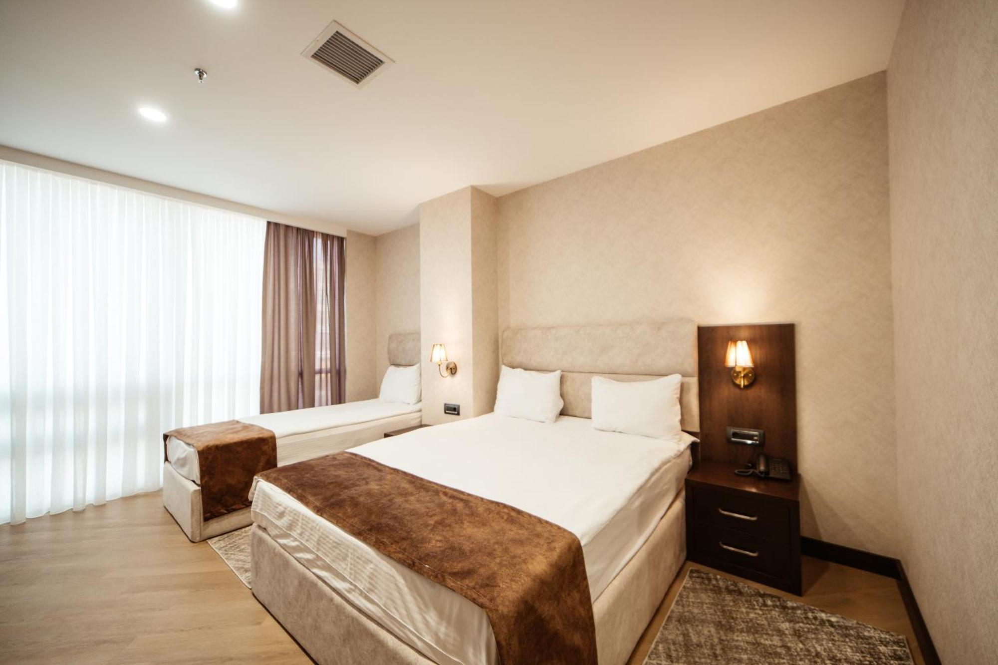 Deluxe Triple Room