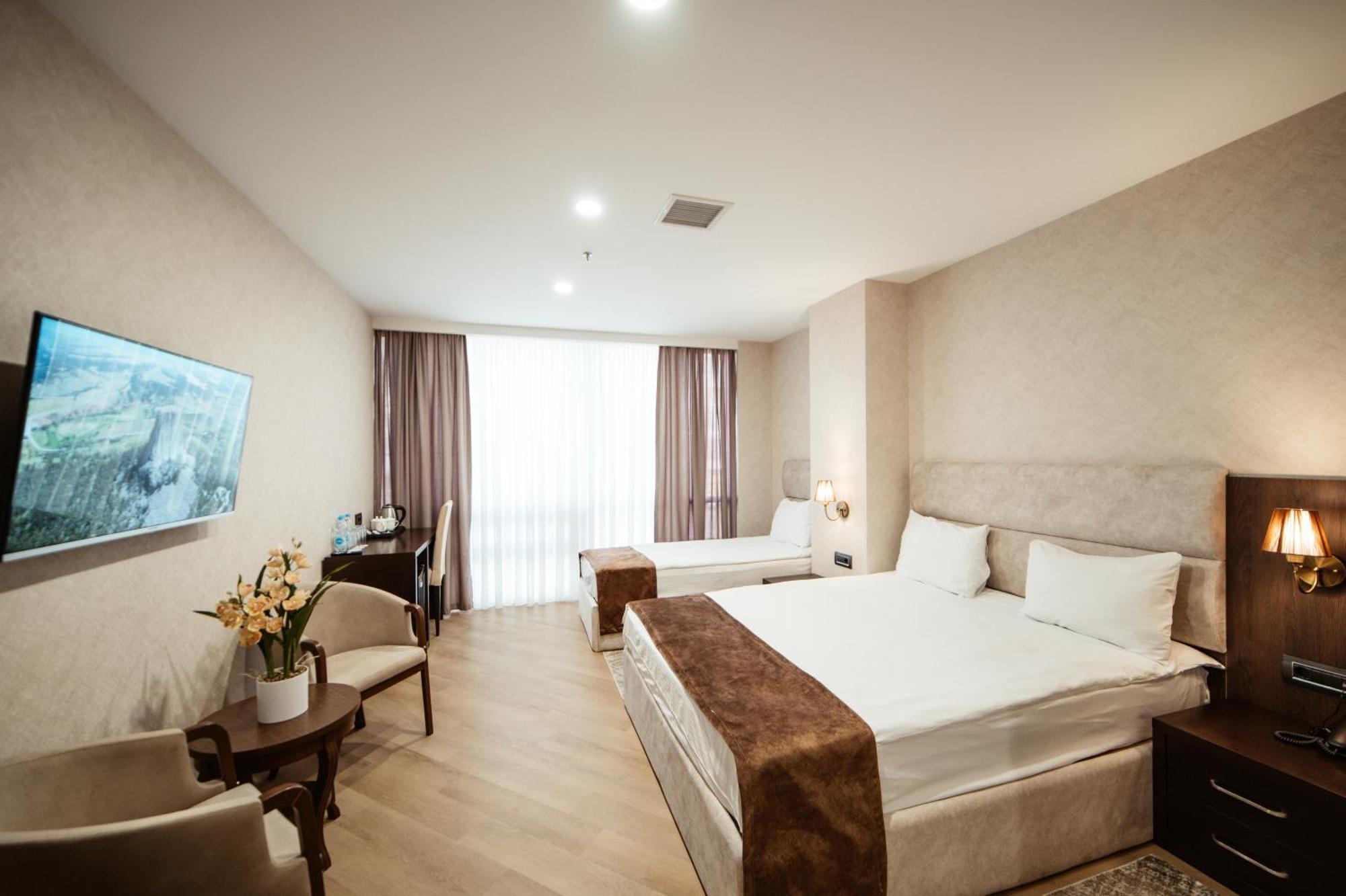 Deluxe Triple Room